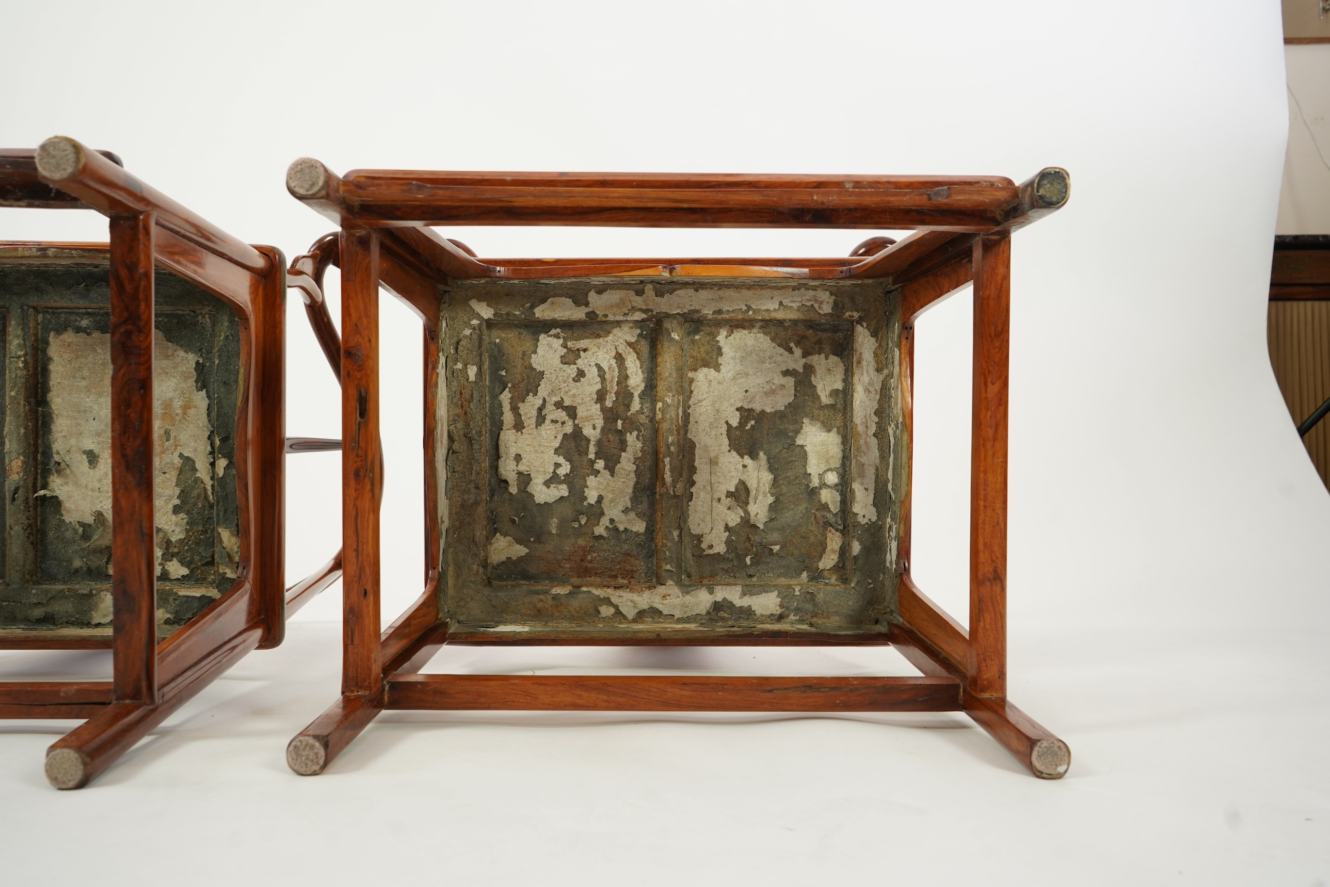 A pair of Chinese huanghuali and brass mounted horseshoe-back armchairs, quanyi, 19th century
